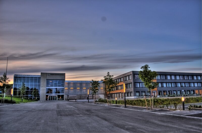 Modern school building at dusk