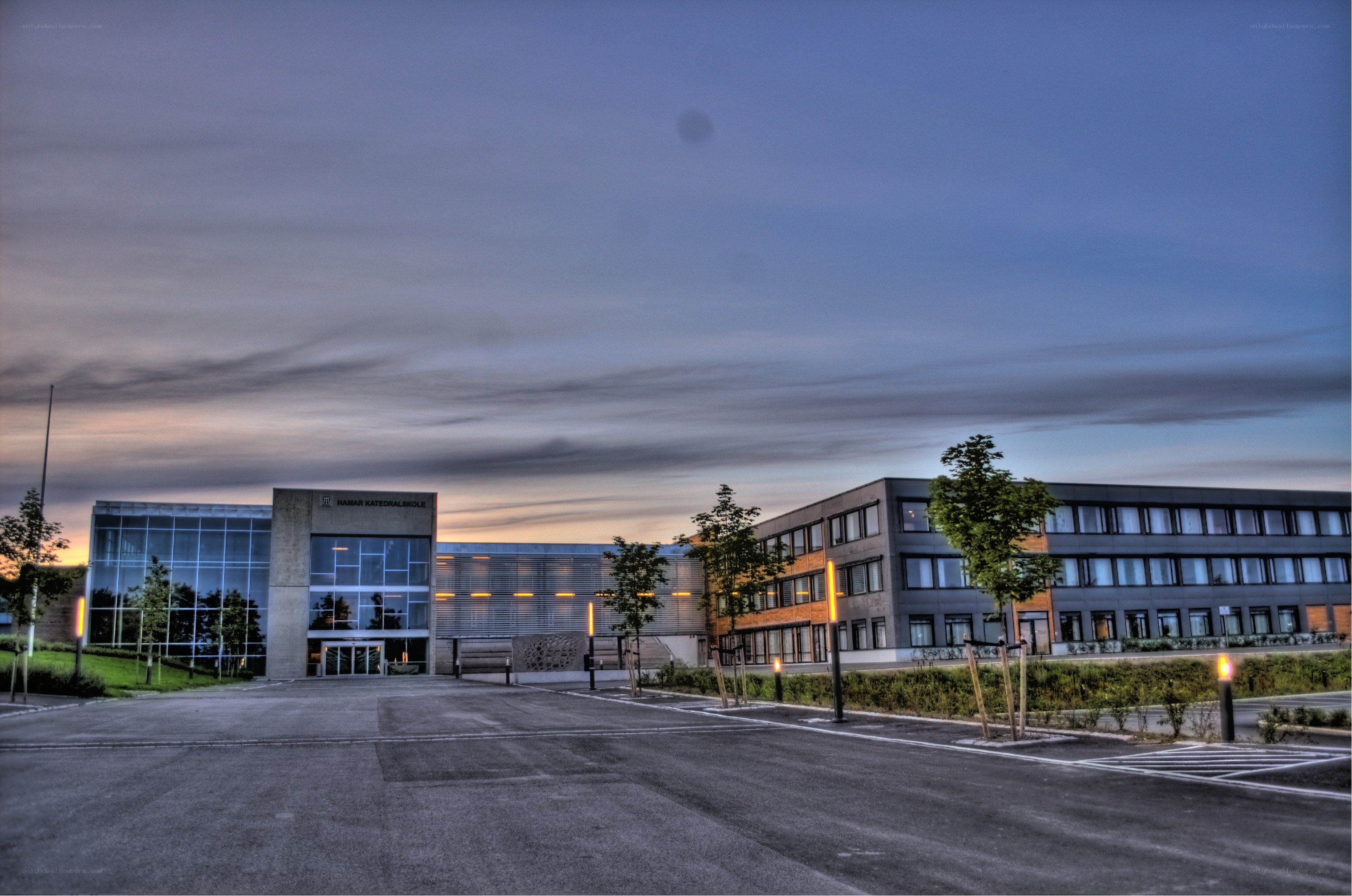 Modern school building at dusk