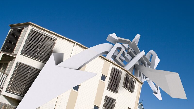 Modern sculpture in front of building