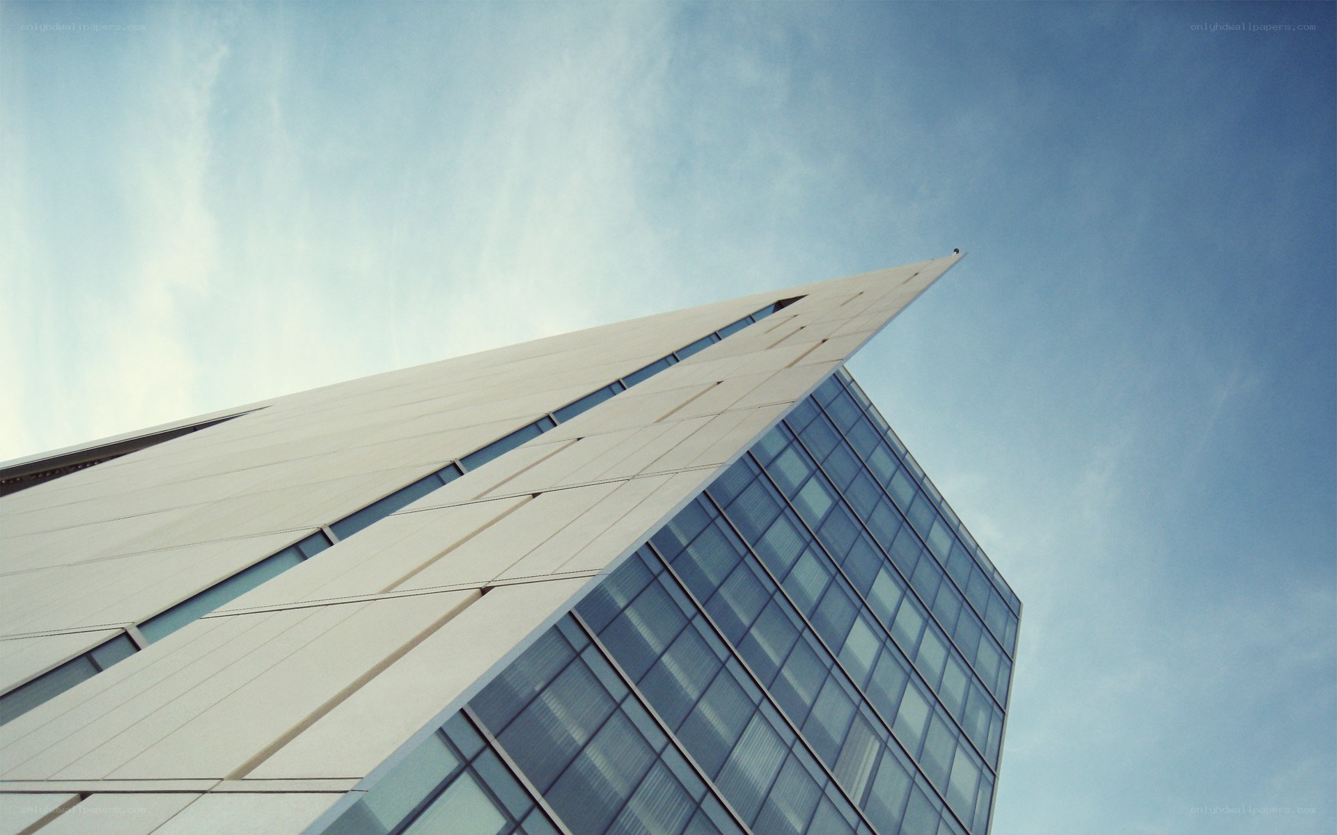 modern skyscraper against blue sky