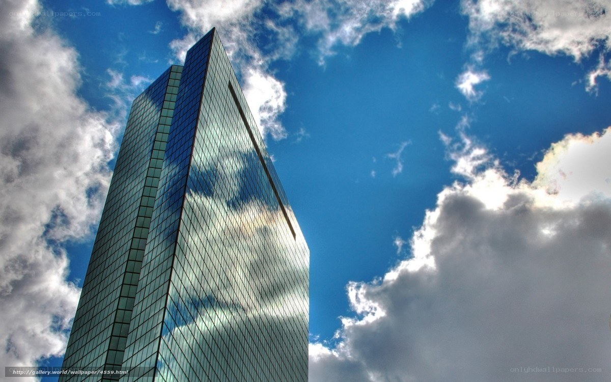Modern skyscraper against blue sky
