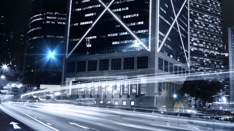 Modern Skyscraper at Night — Blue