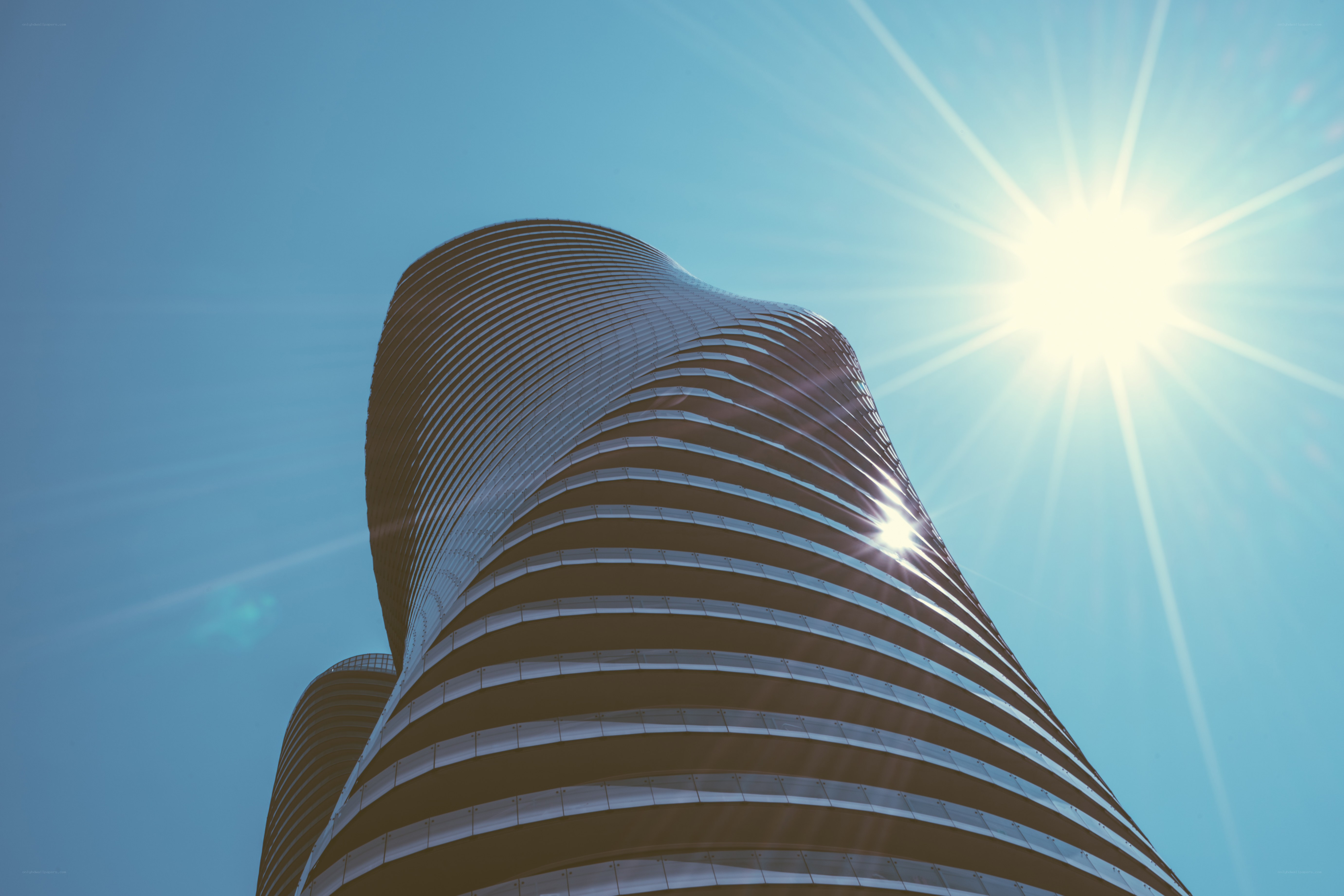 Modern skyscraper under bright sun