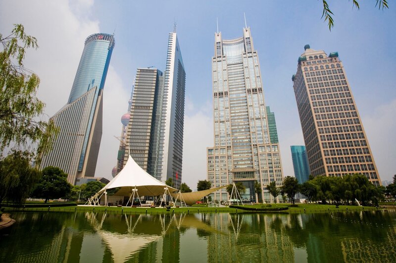 Modern skyscrapers in a city park