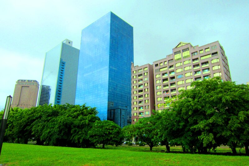 Modern Skyscrapers in Park — Green