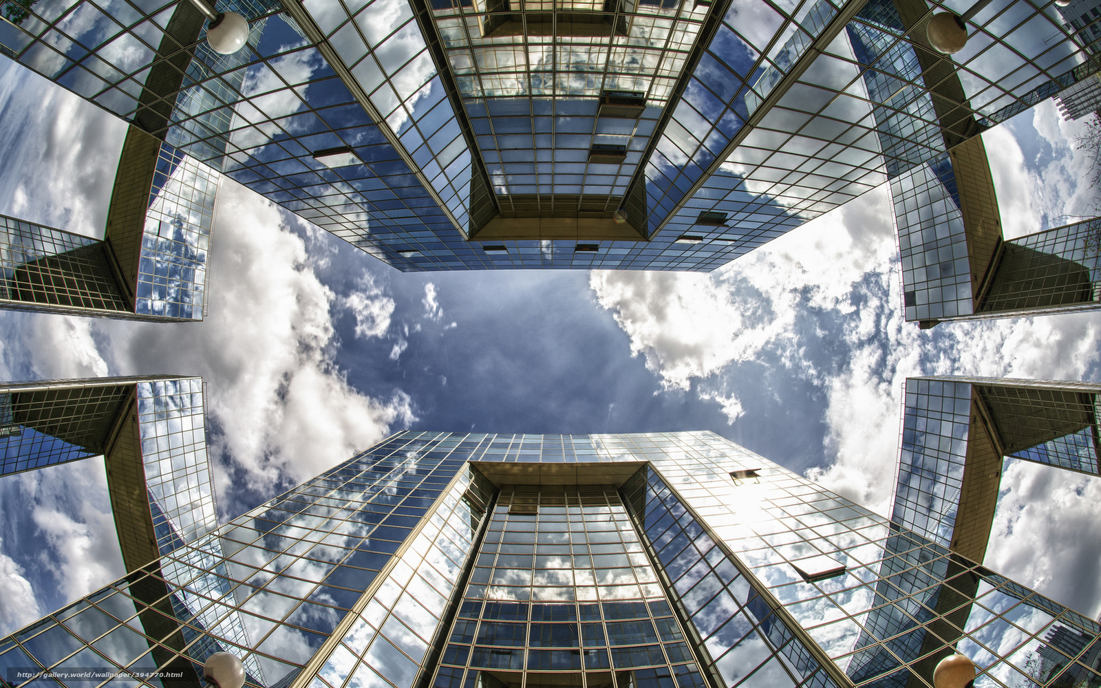 Modern skyscrapers reflecting sky