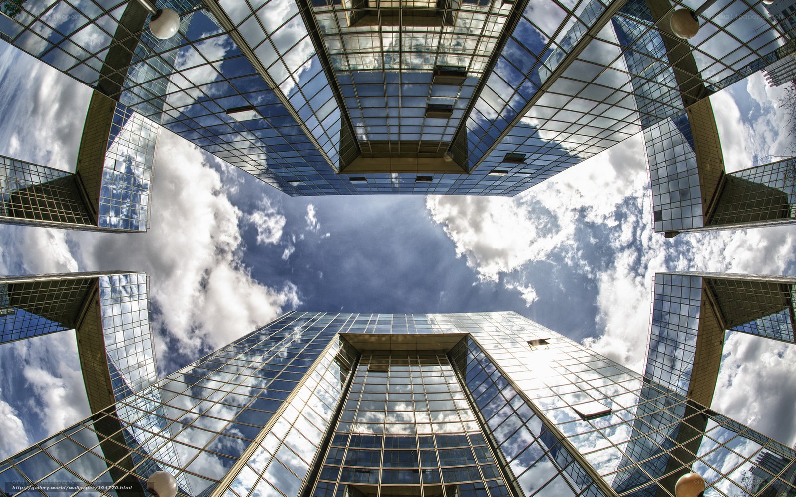 Modern skyscrapers reflecting sky