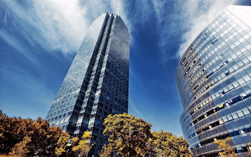 Modern skyscrapers under blue sky
