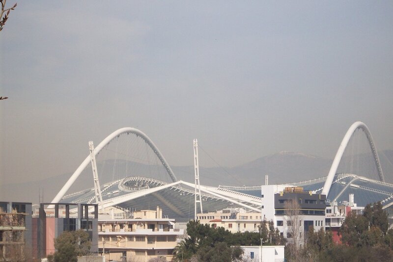 Modern stadium with white arches