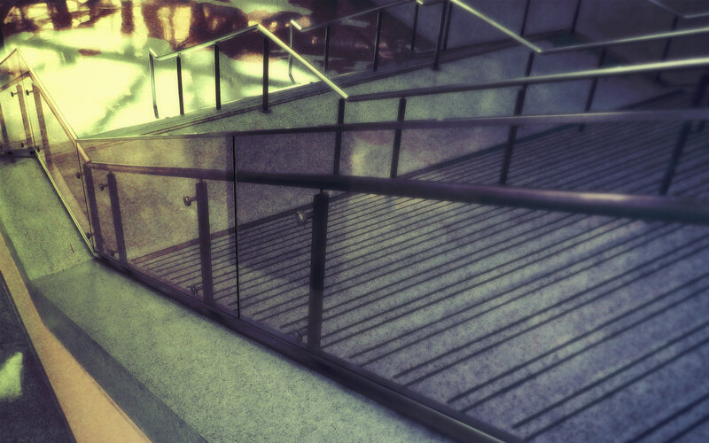 Modern staircase with glass railings