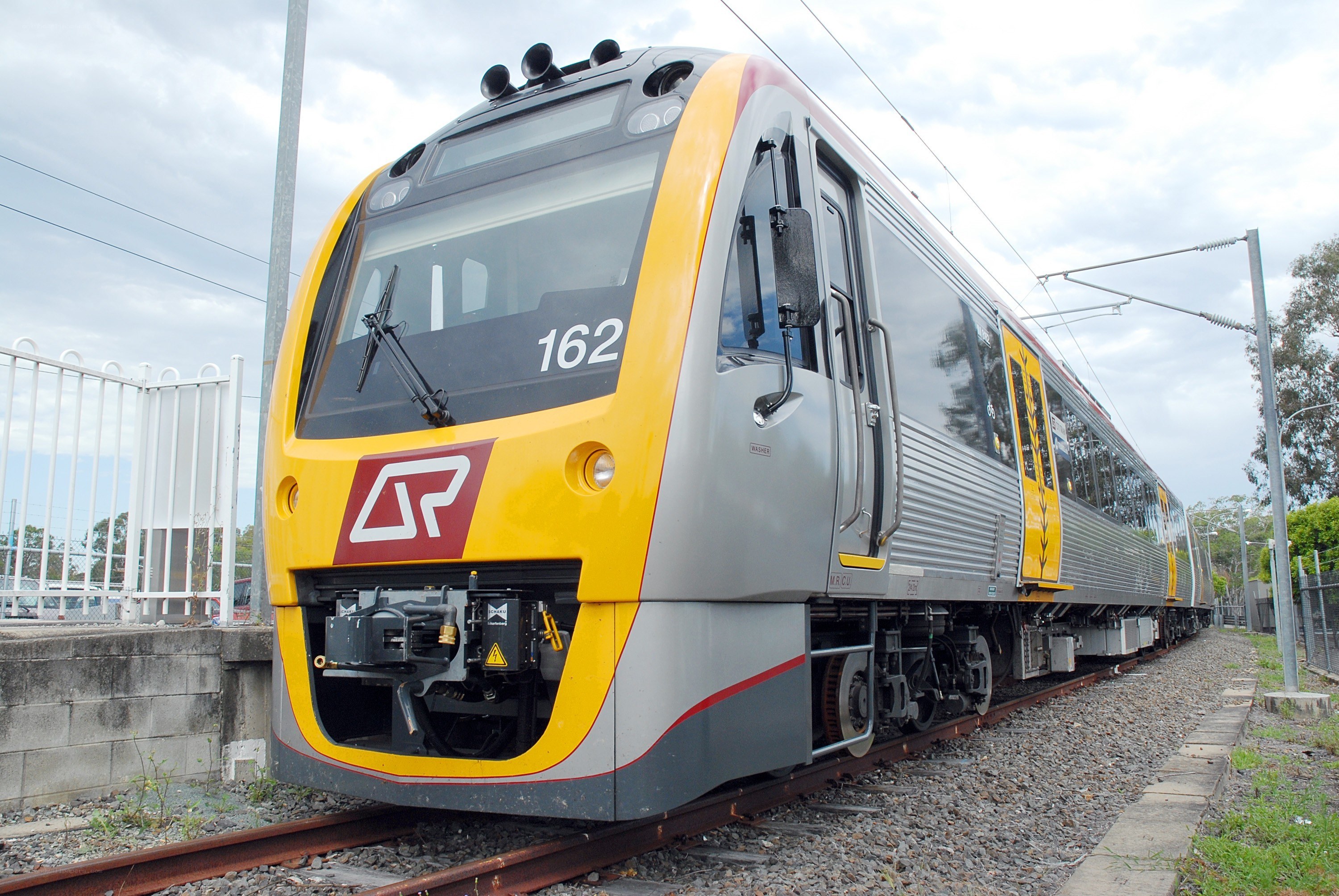 Modern train on railway tracks