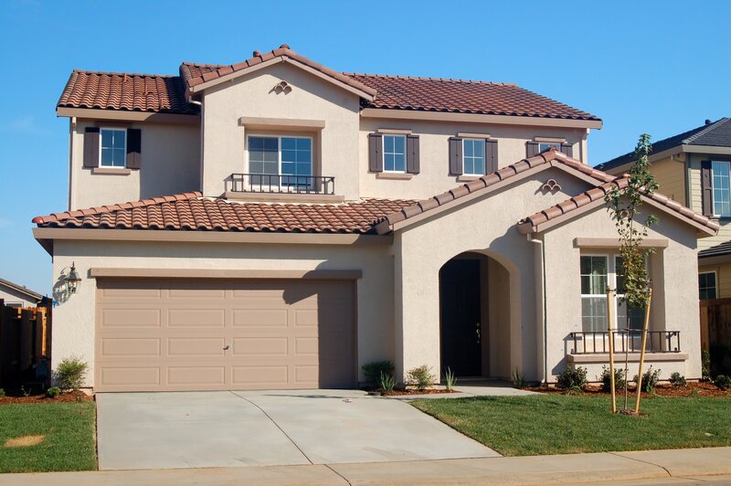 modern two-story house with tiled roof