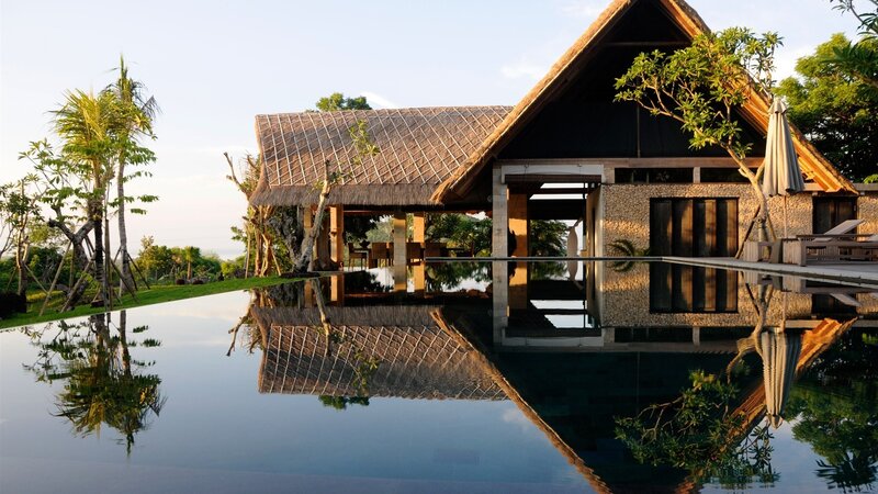 Modern Villa with Pool — Blue, Serene, Sunset, Photograph, Thatched Roof