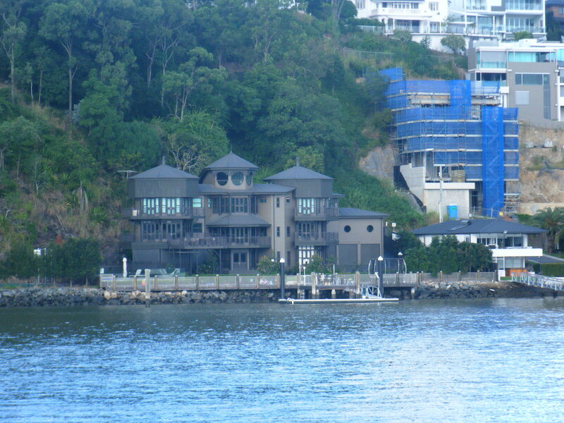 Modern waterfront house on a hillside