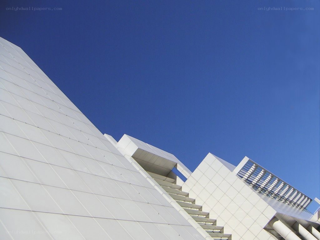 Modern white building against blue sky