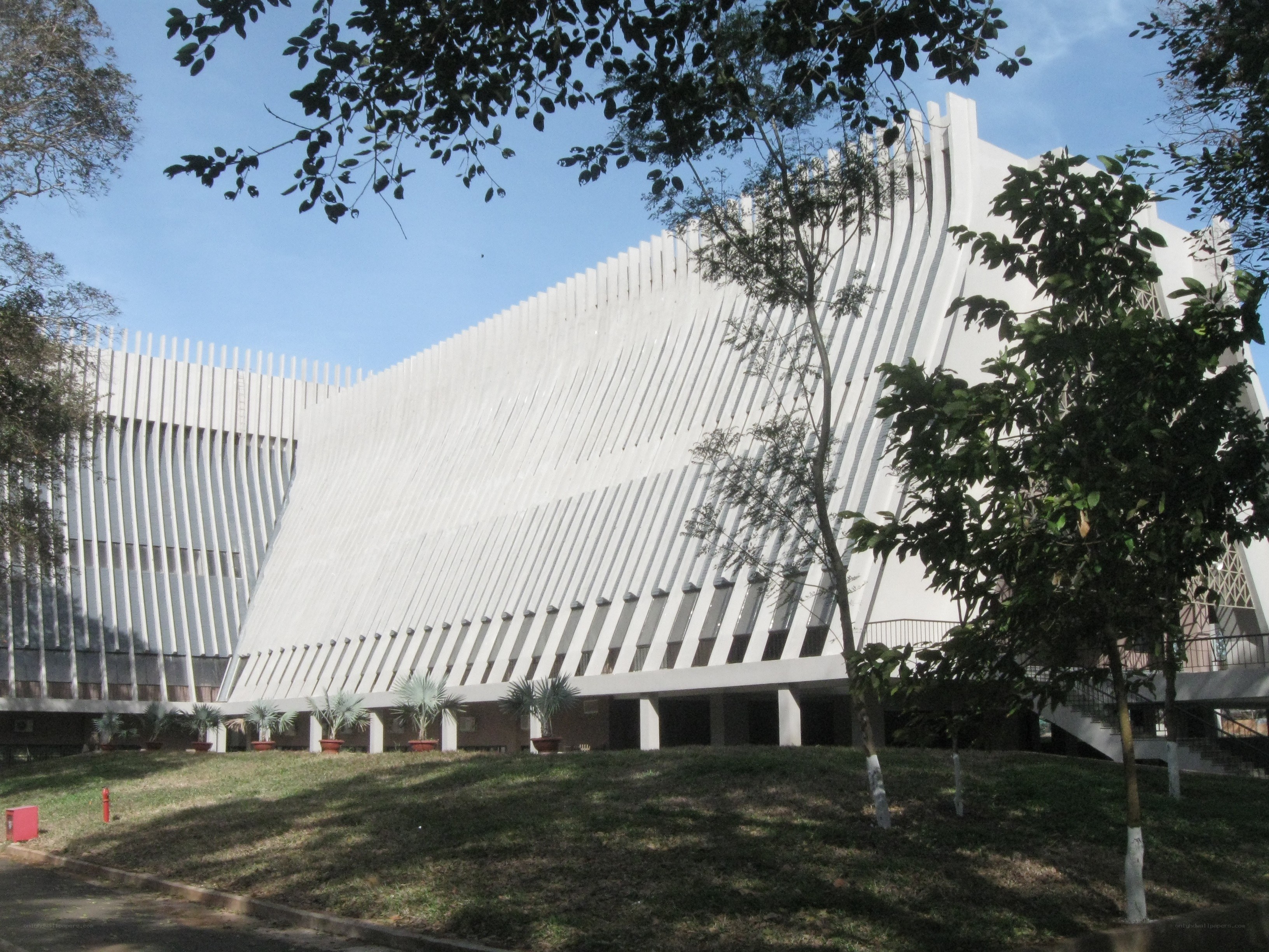 Modern white building with slatted facade