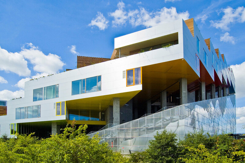 modern white building with yellow accents