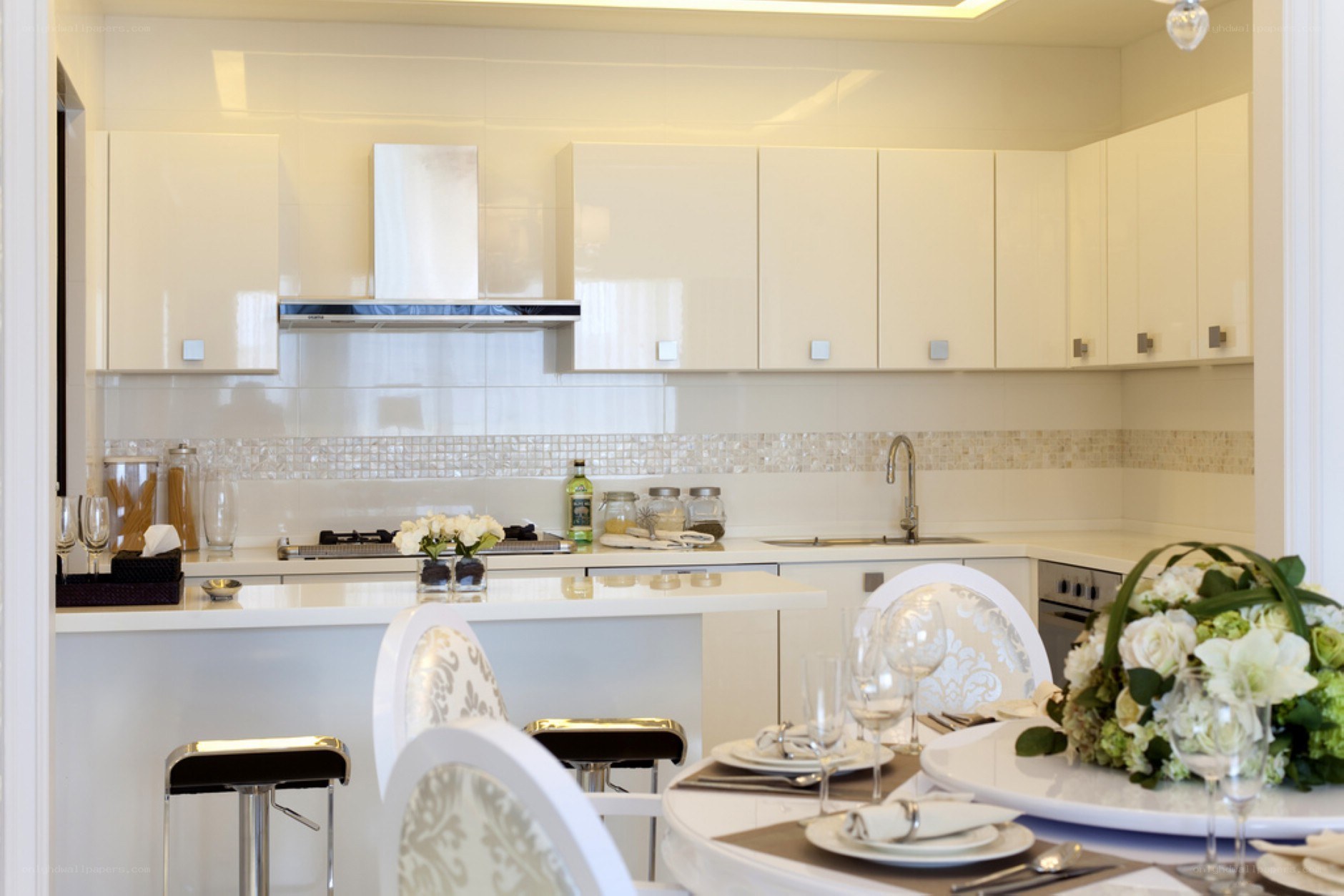Modern white kitchen and dining area