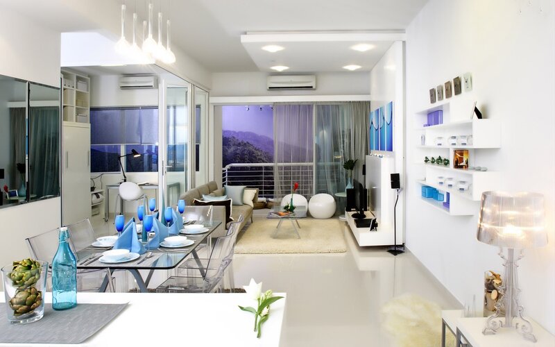 Modern white living room with blue accents