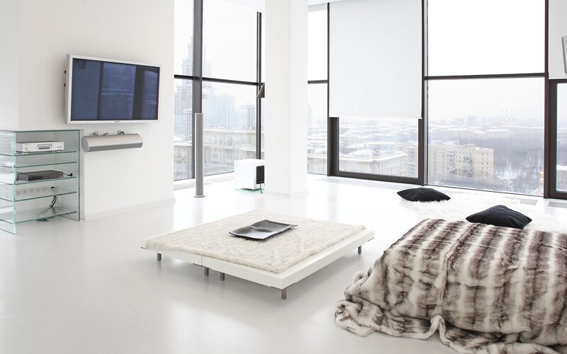 Modern white living room with city view