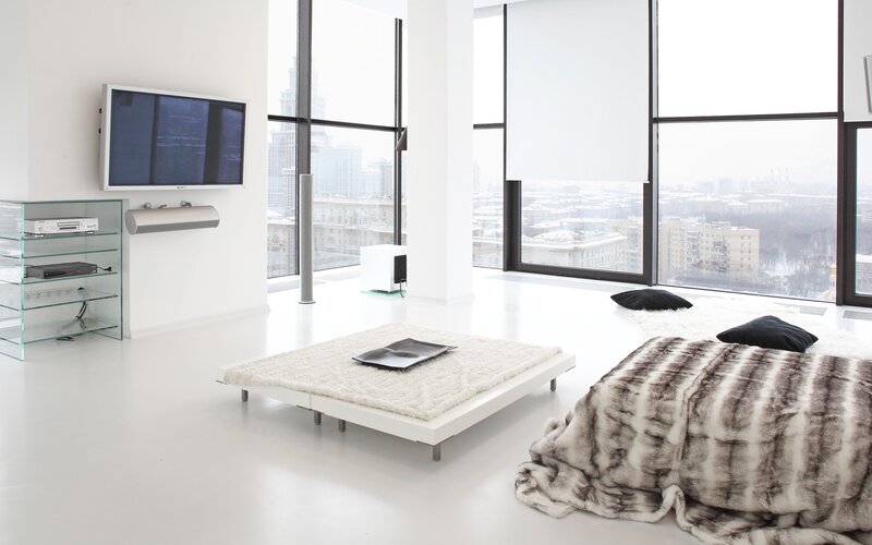 Modern white living room with city view