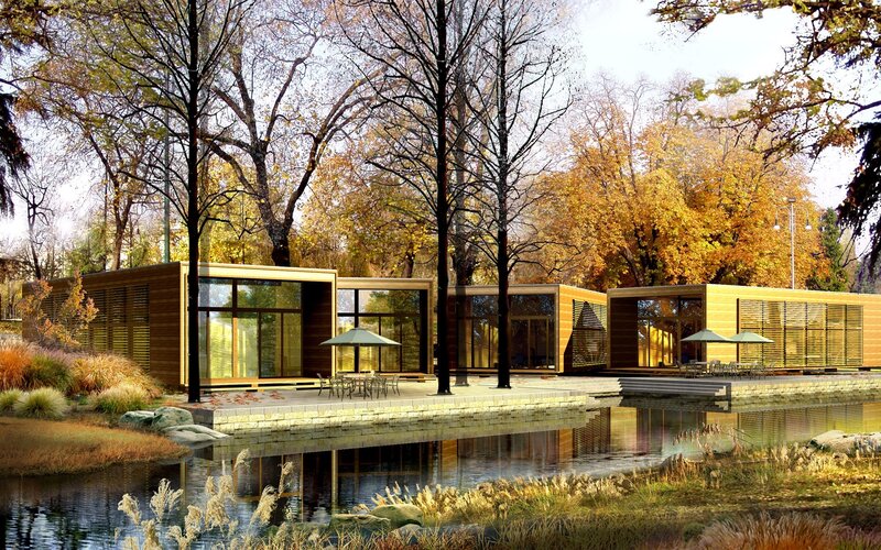 Modern wooden cabins by a pond