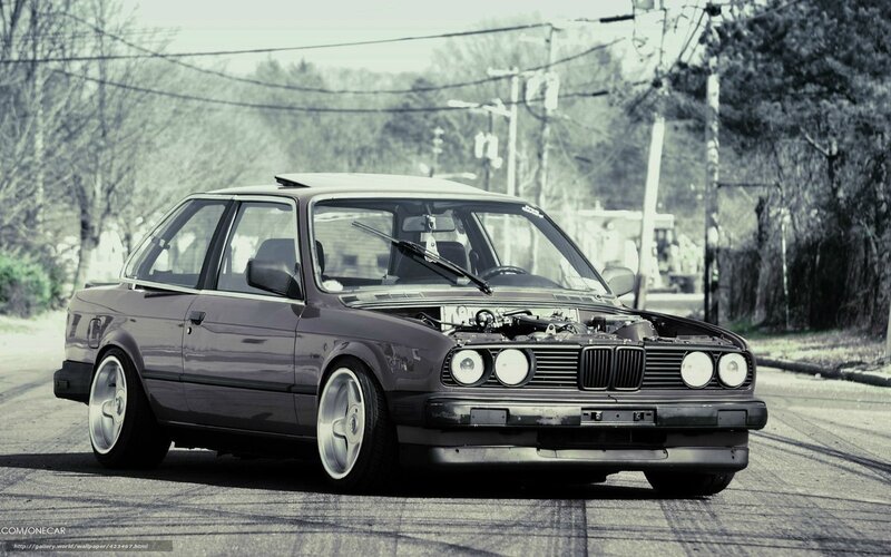 modified bmw e30 on street