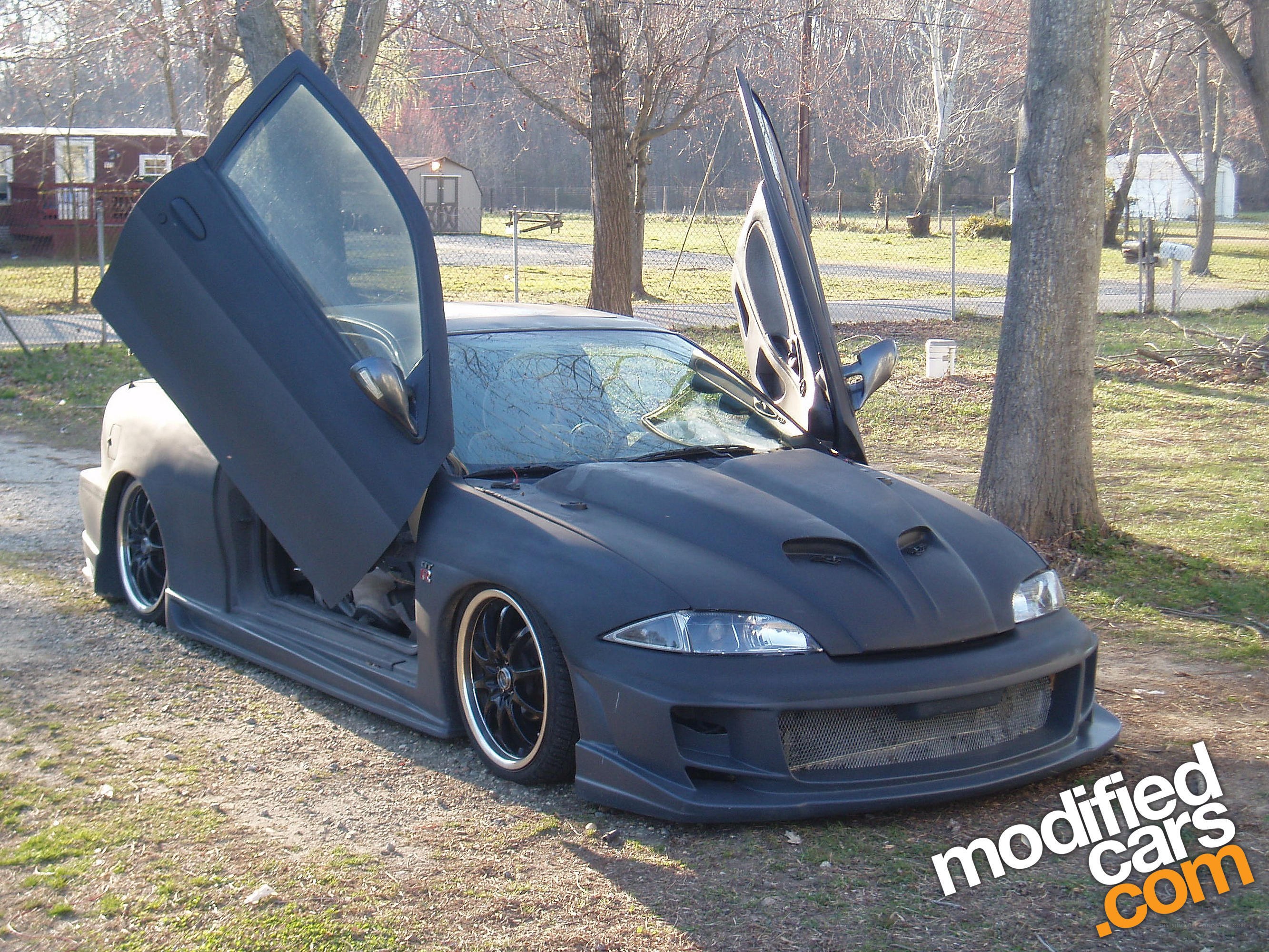 modified car with gullwing doors