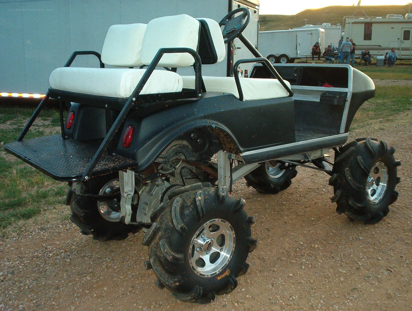 modified golf cart with large tires