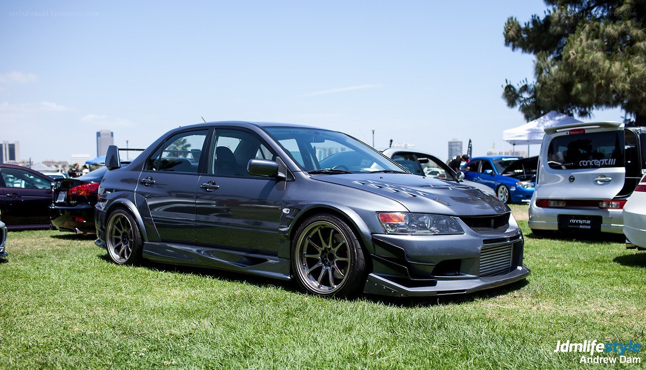 modified grey sedan at car show