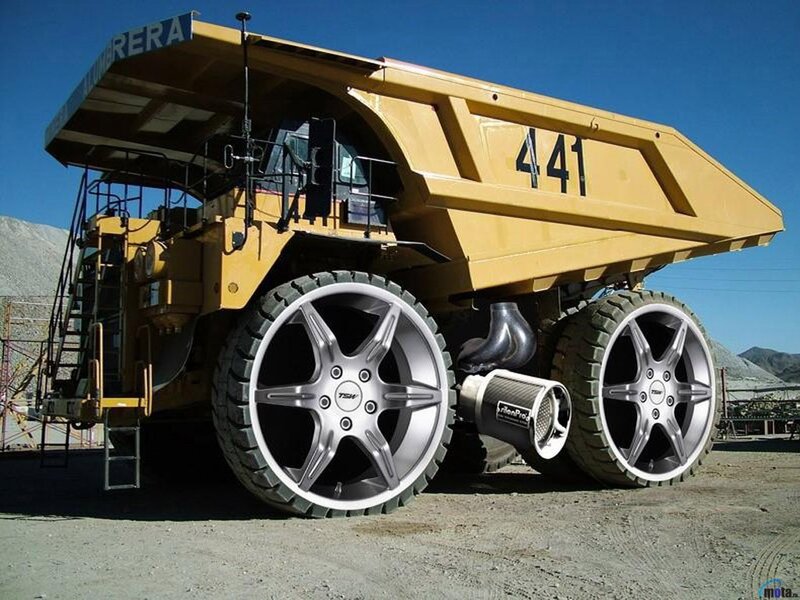 Modified mining truck with custom wheels