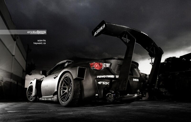 Modified Sports Car — Black, Dramatic, Night, Photograph, Tire