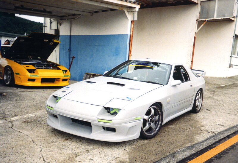 Modified sports cars in garage