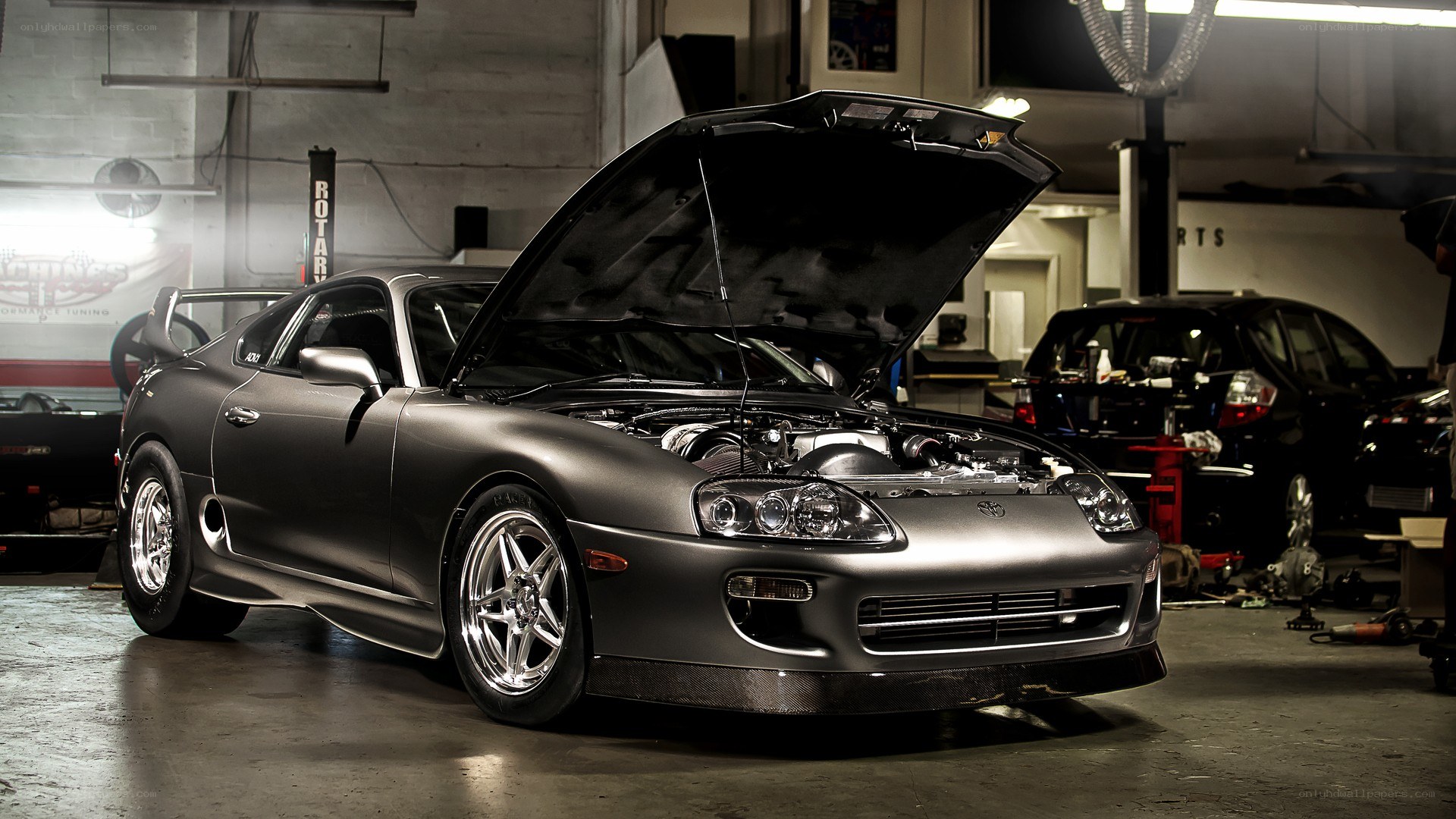 Modified Toyota Supra in garage