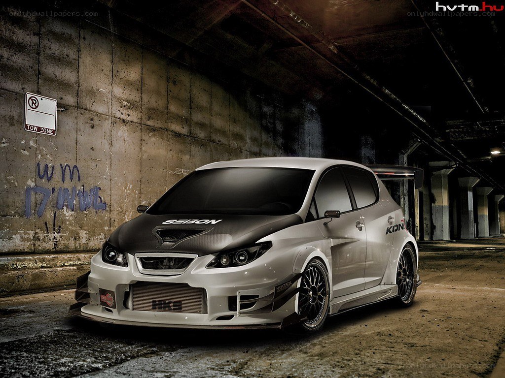 modified white car in underground garage
