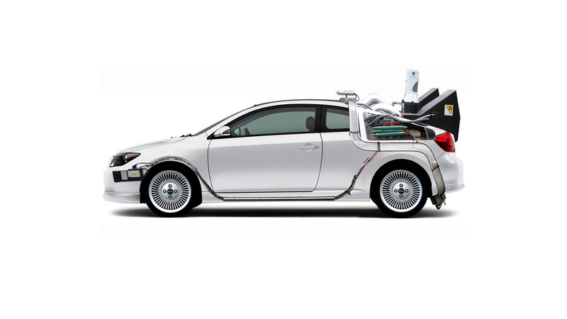 modified white car with exposed components