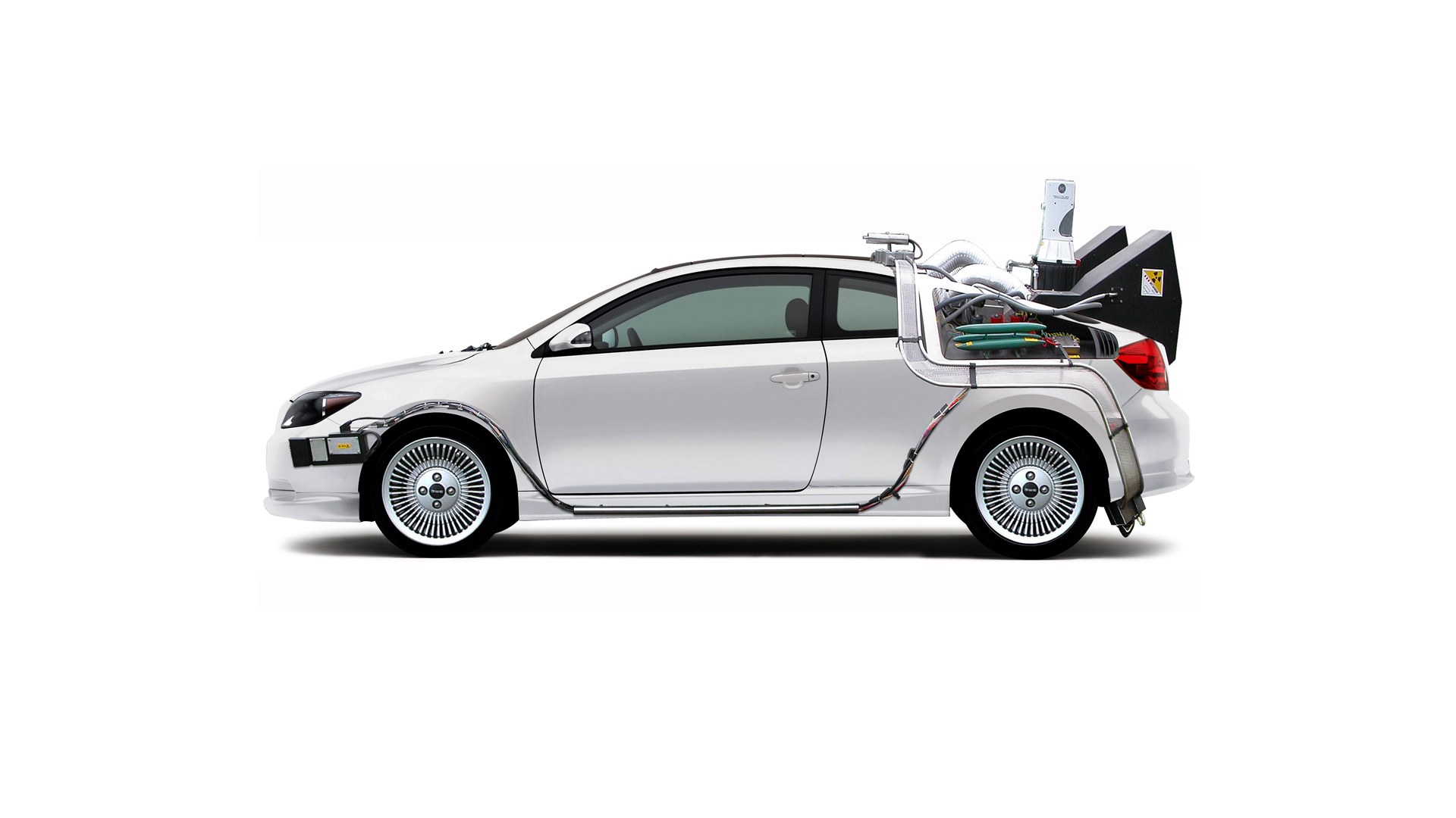 modified white car with exposed components