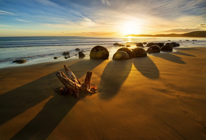 Moeraki Boulders Beach — Gold, Serene, Sunset