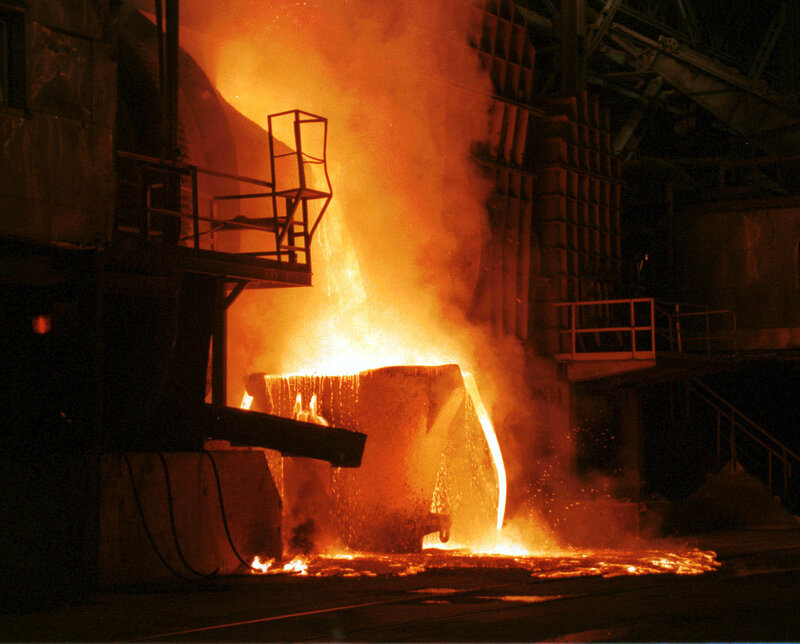 molten metal pouring at steel mill