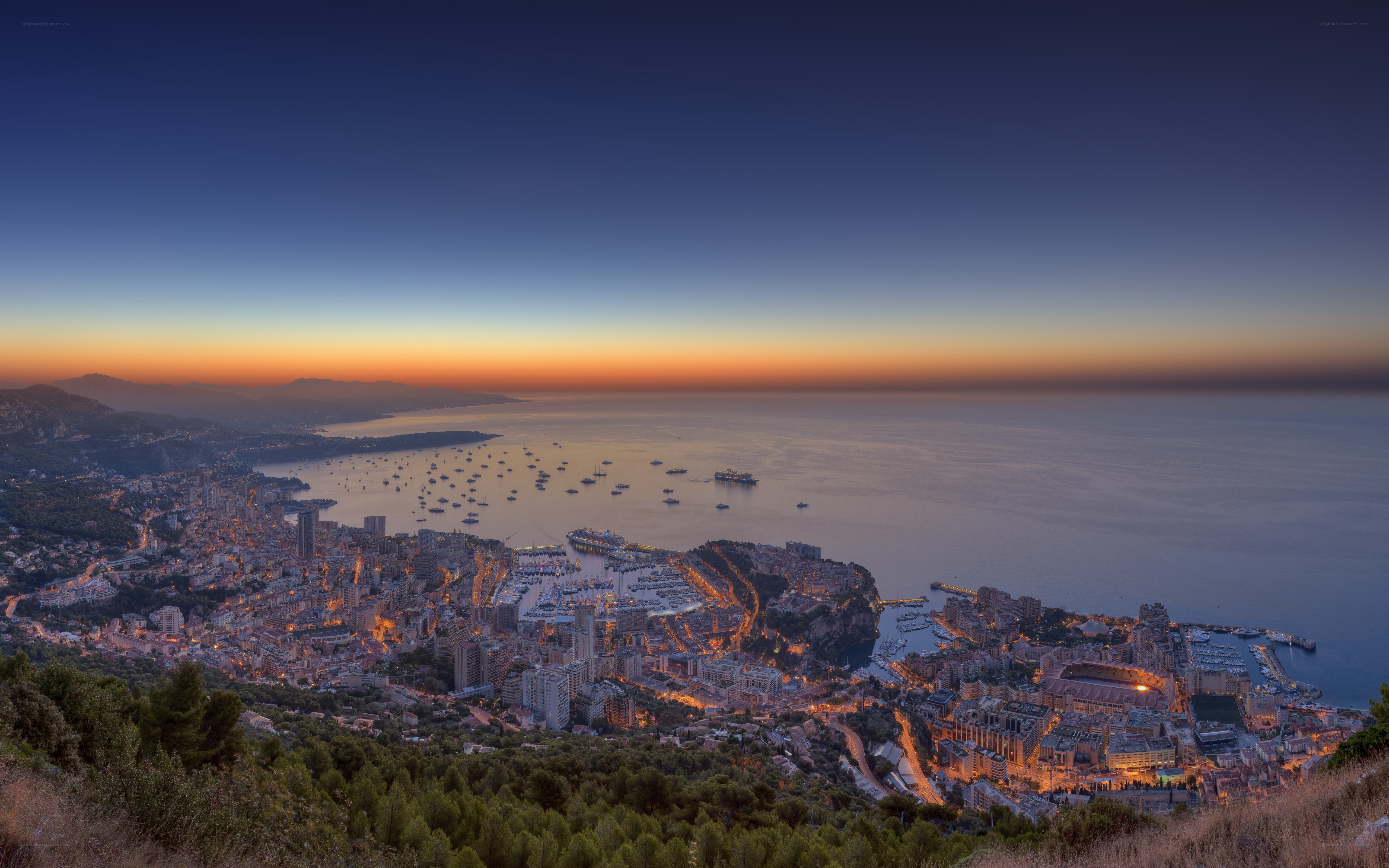 Monaco at dusk from a hill