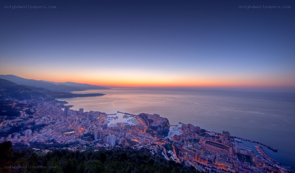 Monaco at dusk from a hill