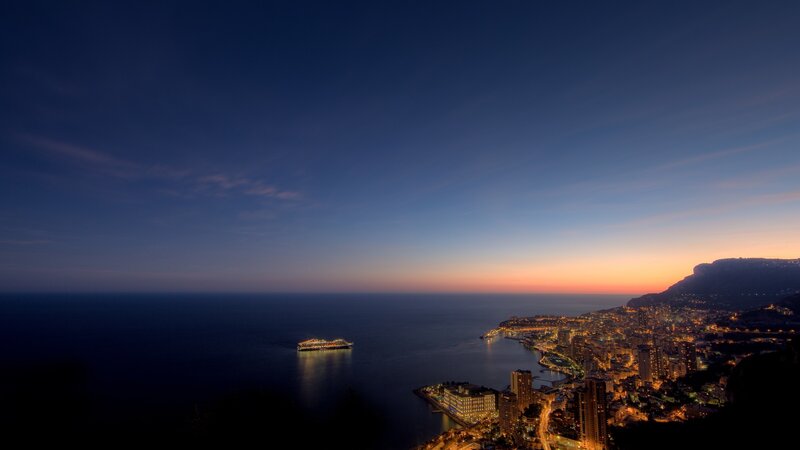 Monaco at dusk with cruise ship