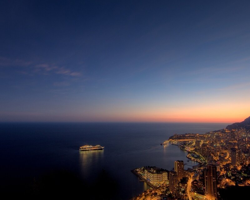 Monaco at dusk with cruise ship