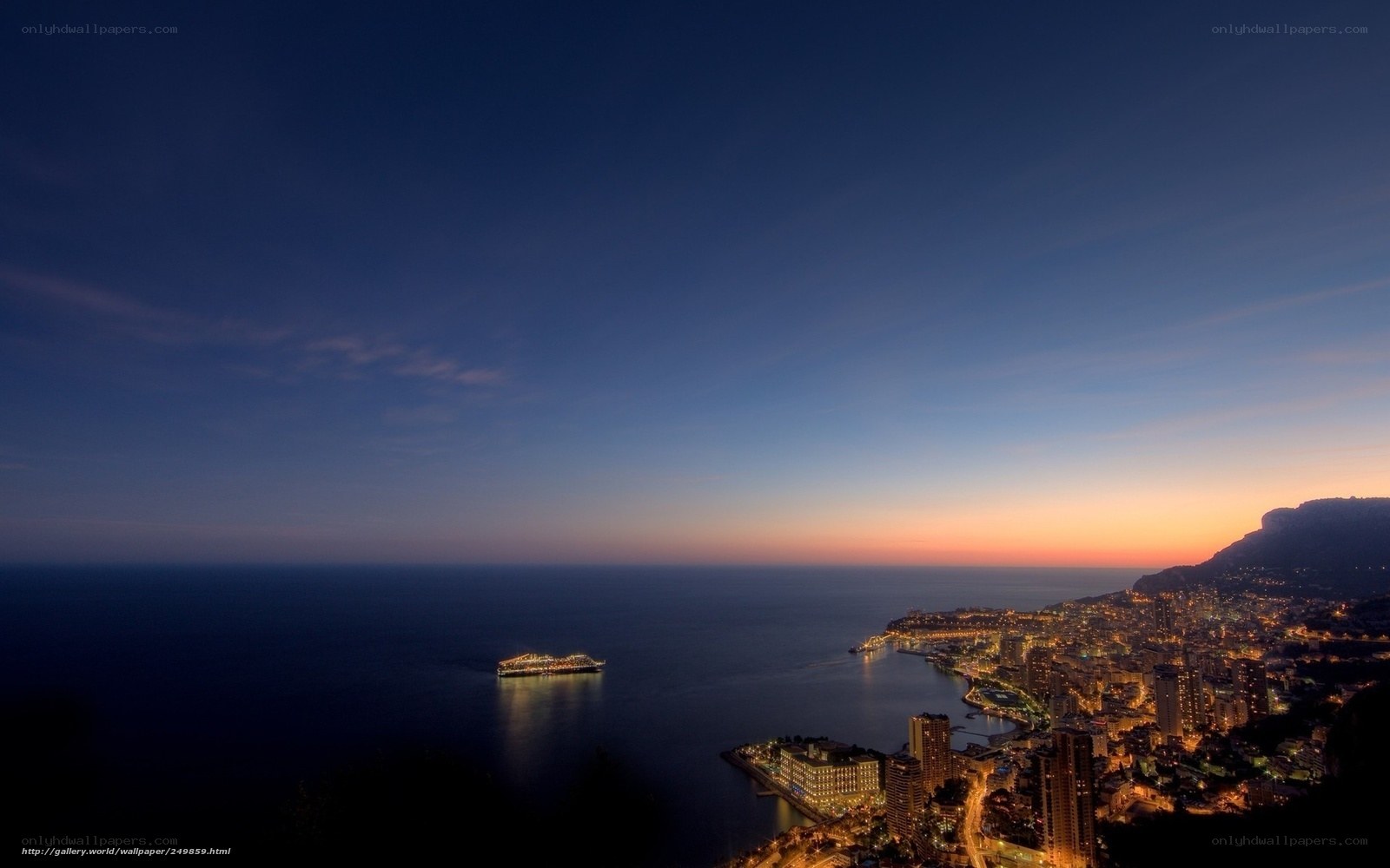 Monaco at dusk with cruise ship