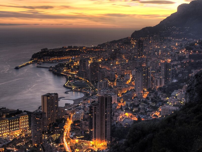 Monaco Cityscape at Dusk — Orange, Dramatic, Sunset, Photograph, Sea, Mountain, Skyscrapers