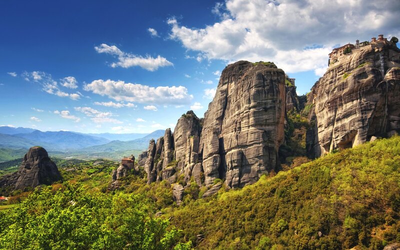 Monasteries on Rock Pillars — Blue, Serene, Afternoon, Photograph, Rock Formations, Green Trees