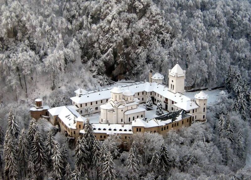 Monastery in Snowy Forest