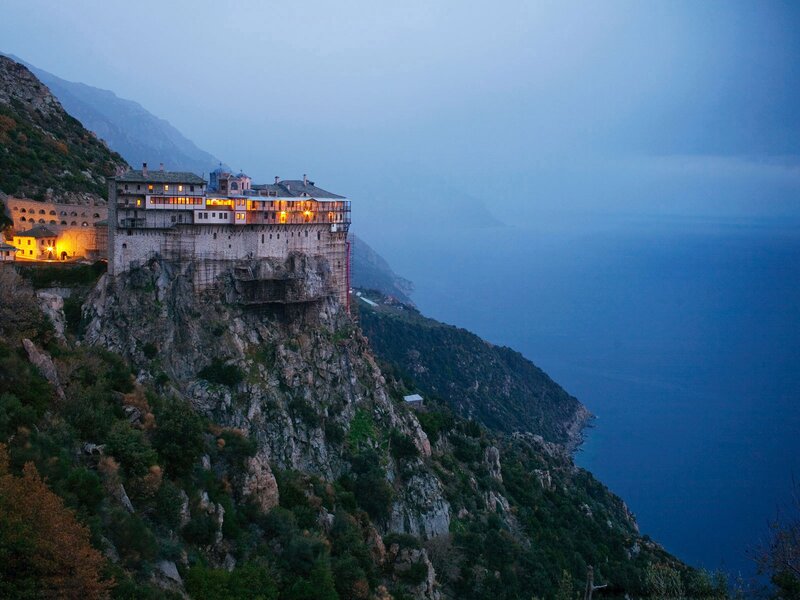Monastery on a cliff at dusk