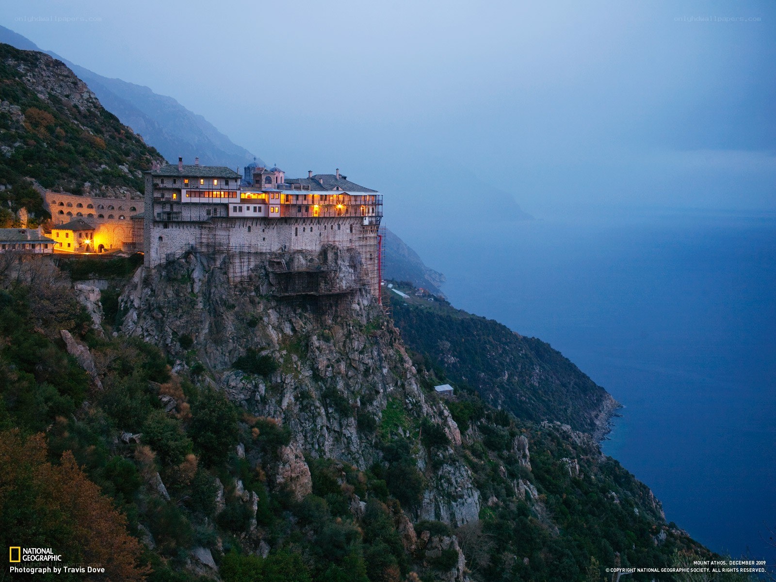 Monastery on a cliff at dusk