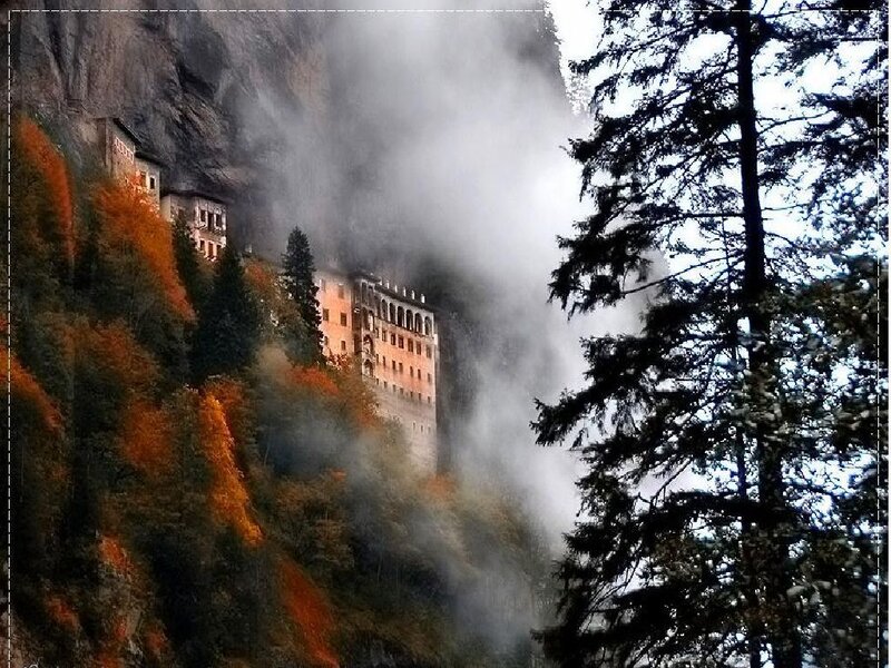 Monastery on a misty cliff